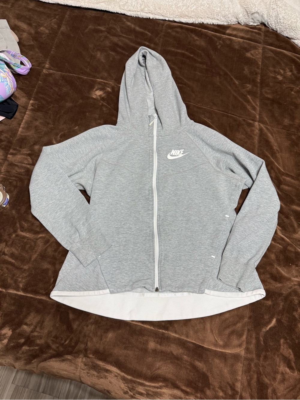 Woman’s size medium Nike Light Gray Full-Zip Hooded Sweatshirt